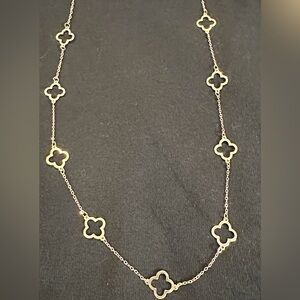 Long gold quatrefoil necklace